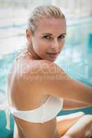 Attractive woman getting in the water
