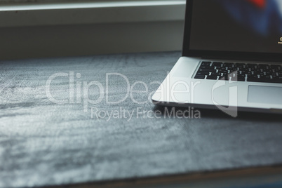 Laptop on modern wooden desk