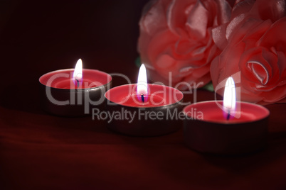 Beautiful red candles in the darkness