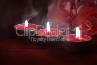 Beautiful red candles in the darkness