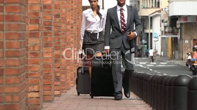 Business Man and Woman Walking