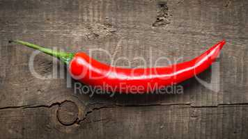 Red chili on wood