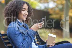 African American Teenager Woman Drinking Coffee and Texting