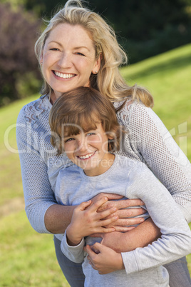 Mother Son Woman Boy Child Laughing Outside in Sunshine