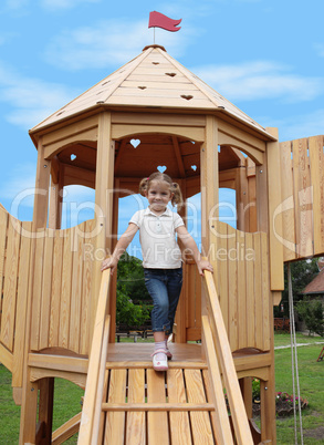 beauty little girl on playground