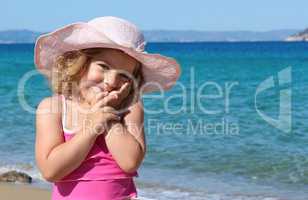 beauty little girl with straw hat portrait