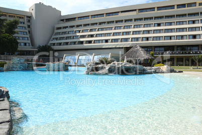 hotel with tropic bar and swimming pool