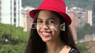Teen Girl Posing with red Hat