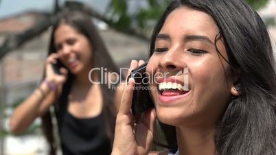 Teen Girls Having a Conversation by Cell