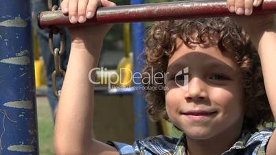 Boy Smiling on Playground