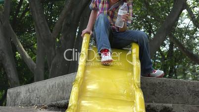 Boys Playing on Slide