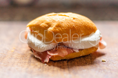 Macro of small sandwich with ham and mozzarella