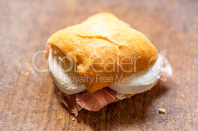 Macro of small sandwich with ham and mozzarella