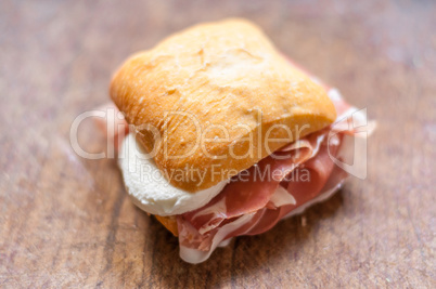 Macro of small sandwich with ham and mozzarella