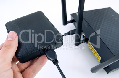 Router with backup storage disk. DLNA media server from USB disk