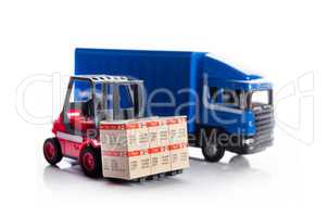 Forklift truck toys with boxes. Concept of international freight