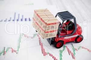 Forklift truck toys with boxes. Concept of international freight