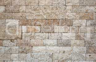 Elegant stone wall from small rectangular parts