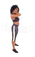African American woman in exercise outfit.
