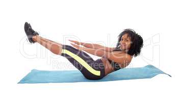 Pretty African American girl exercising.