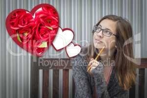 Daydreaming Girl Next To Floating Hearts with Red Roses