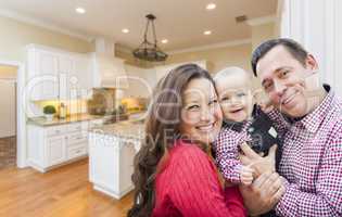 Young Family Inside Beautiful Custom Kitchen