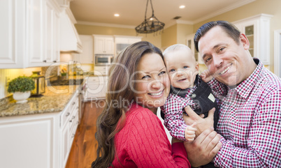 Young Family Inside Beautiful Custom Kitchen