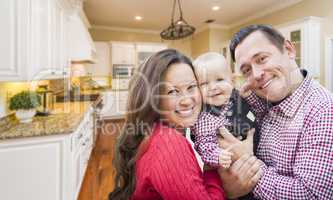 Young Family Inside Beautiful Custom Kitchen