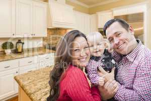 Young Family Inside Beautiful Custom Kitchen