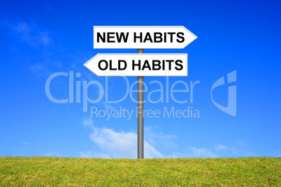Schild Wegweiser zeigt Old habits oder new Habits