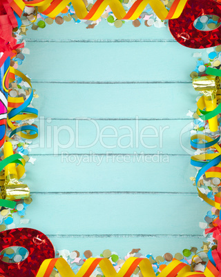 Empty frame for carnival on wood background