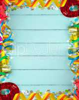 Empty frame for carnival on wood background