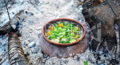 Roast in a clay pot over charcoal