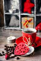 Cup decorated with wooden hearts