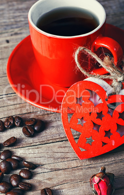 Cup decorated with wooden hearts