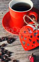 Cup decorated with wooden hearts