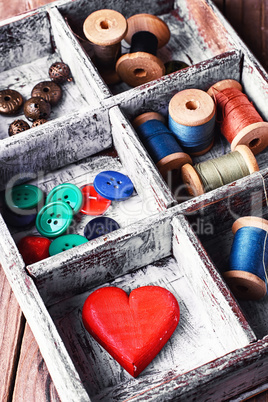 Box with sewing accessories