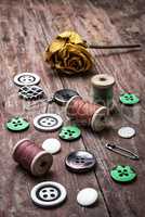 sewing buttons and thread