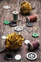 sewing buttons and thread