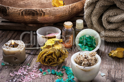 bronze bowl with water and accessories spa treatments
