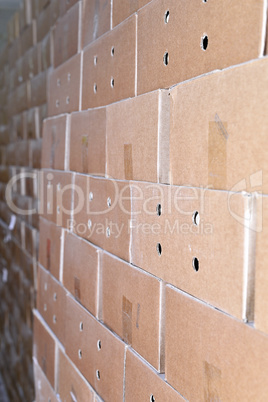 Cardboard packing boxes in a warehouse, background