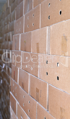 Cardboard packing boxes in a warehouse, background