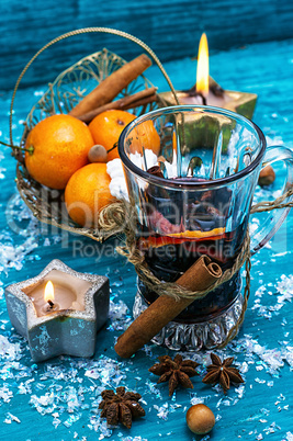 drink mulled wine on bright blue background.