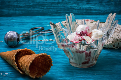 ice cream in  bowl and two waffle cup