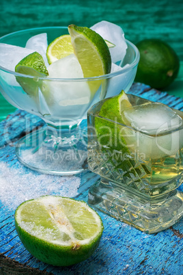 alcoholic cocktail with additions of lime