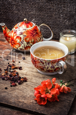 porcelain cup of fragrant tea for medicinal herbs in retro style