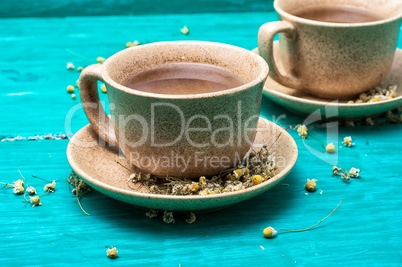 tea brewed with chamomile in ceramic mugs