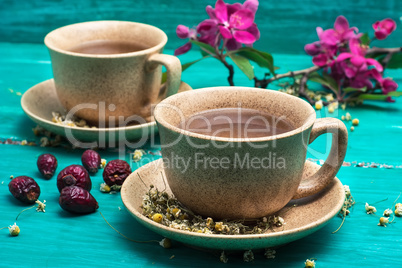 tea brewed with chamomile in ceramic mugs