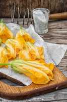 Yellow pumpkin flowers,as an element of meals