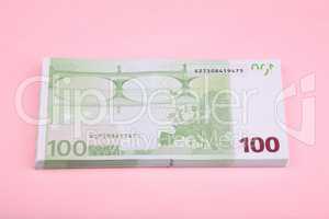 europe euros banknote of hundreds on pink